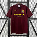 Camisa Manchester City Away 2012/13 - Umbro Retrô Masculina - Vinho/Dourada