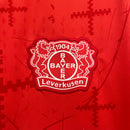 Camisa Bayer Leverkusen Home 2024/25 - Castore Torcedor Masculina - Vermelha/Preta