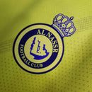 camisa-al-nassr-home-1-titular-2022-23-duneus-torcedor-masculina-masculino-amarela-amarelo-azul-cr7-cristiano-ronaldo-alvaro-gonzalez-luiz-gustavo-arabia-shurfah