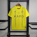 camisa-al-nassr-home-titular-1-2023-24-nike-torcedor-masculina-azul-amarelo-amarela-cr7-cristiano-ronaldo-aroya-kafd