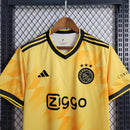 camisa-masculina-adidas-ajax-2023-24-torcedor-amarelo-amarela-preto-preta-ziggo-curaçao-giganet-gola-v