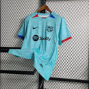 camisa-masculina-barcelona-barca-third-terceira-3-2023-24-nike-torcedor-azul-vermelha-vermelho-verde-preto-preta-fcb-spotify-messi-neymar