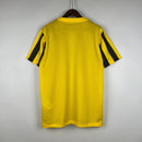 camisa-masculina-nike-al-Ittihad-home-titular-1-2023-24-torcedor-amarelo-amarela-preto-preta-arabia-saudita-benzema