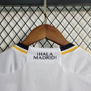camisa-real-madrid-madri-home-titular-1-2023-24-adidas-emirates-fly-better-torcedor-feminina-branca-branco-azul-cr7-vini-jr-kroos