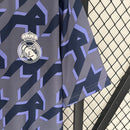 camisa-real-madrid-madri-treino-torcedor-adidas-masculina-2024-25-azul-lilas-cr7-ronaldo-vini-jr-mbappe