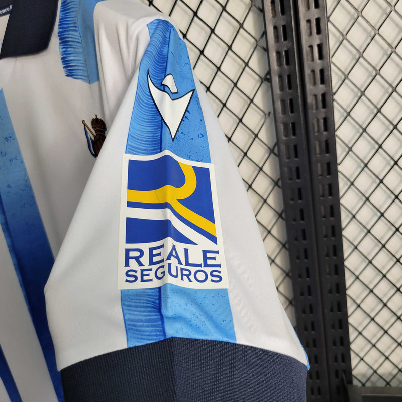 Camisa Real Sociedad Home 2023/24 - Torcedor Masculina - Branca/Azul