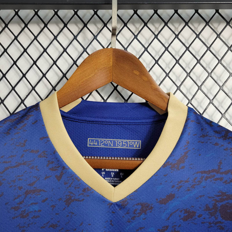 Camisa Manchester City Away 2023/24 - Puma Torcedor Masculina - Azul/Dourada