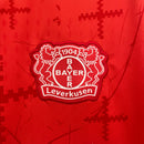 Camisa Bayer Leverkusen Home 2024/25 - Castore Torcedor Masculina - Vermelha/Preta