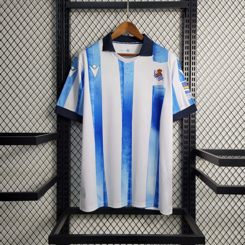 Camisa Real Sociedad Home 2023/24 - Torcedor Masculina - Branca/Azul