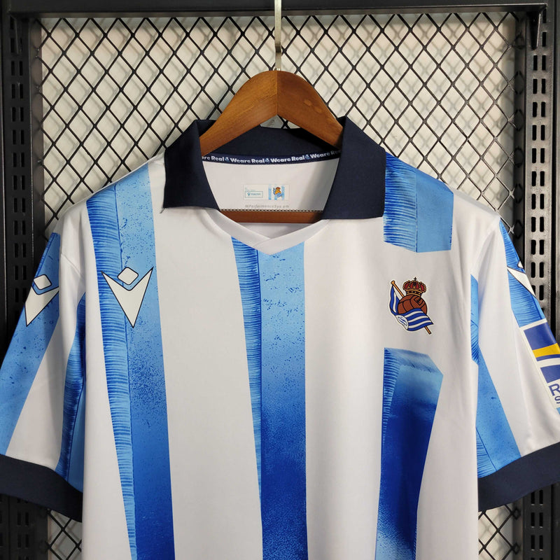 Camisa Real Sociedad Home 2023/24 - Torcedor Masculina - Branca/Azul