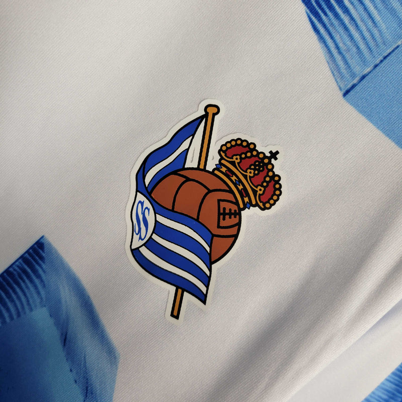 Camisa Real Sociedad Home 2023/24 - Torcedor Masculina - Branca/Azul