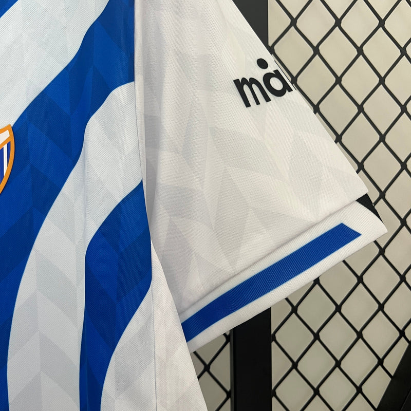 Camisa Malaga Edição Especial 2024/25 - Hummel Torcedor Masculina - Branca/Azul