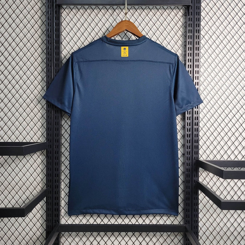 camisa-al-nassr-away-reserva-2-2023-24-nike-torcedor-masculina-azul-amarelo-amarela-cr7-cristiano-ronaldo-aroya-kafd