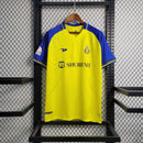 camisa-al-nassr-home-1-titular-2022-23-duneus-torcedor-masculina-masculino-amarela-amarelo-azul-cr7-cristiano-ronaldo-alvaro-gonzalez-luiz-gustavo-arabia-shurfah
