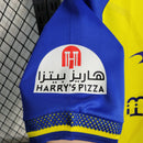 camisa-al-nassr-home-1-titular-2022-23-duneus-torcedor-masculina-masculino-amarela-amarelo-azul-cr7-cristiano-ronaldo-alvaro-gonzalez-luiz-gustavo-arabia-shurfah
