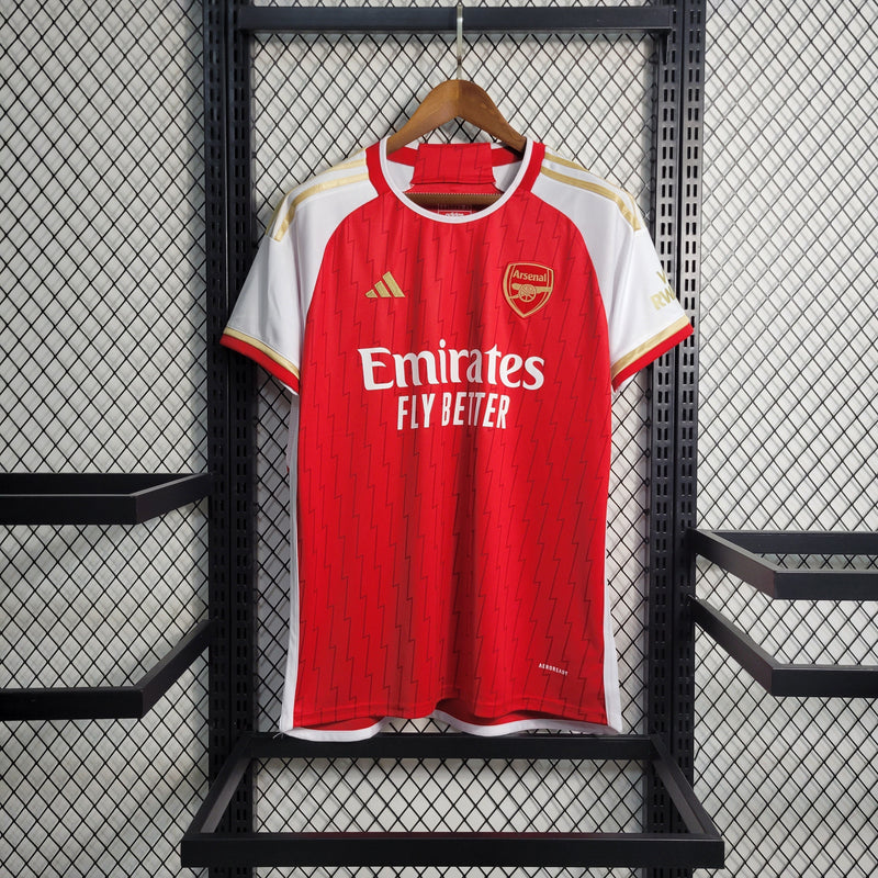 camisa-arsenal-home-titular-1-2023-24-adidas-torcedor-masculina-vermelha-vermelho-branco-branca-dourada-dourado-emirates-fly-better-dorado-dorada