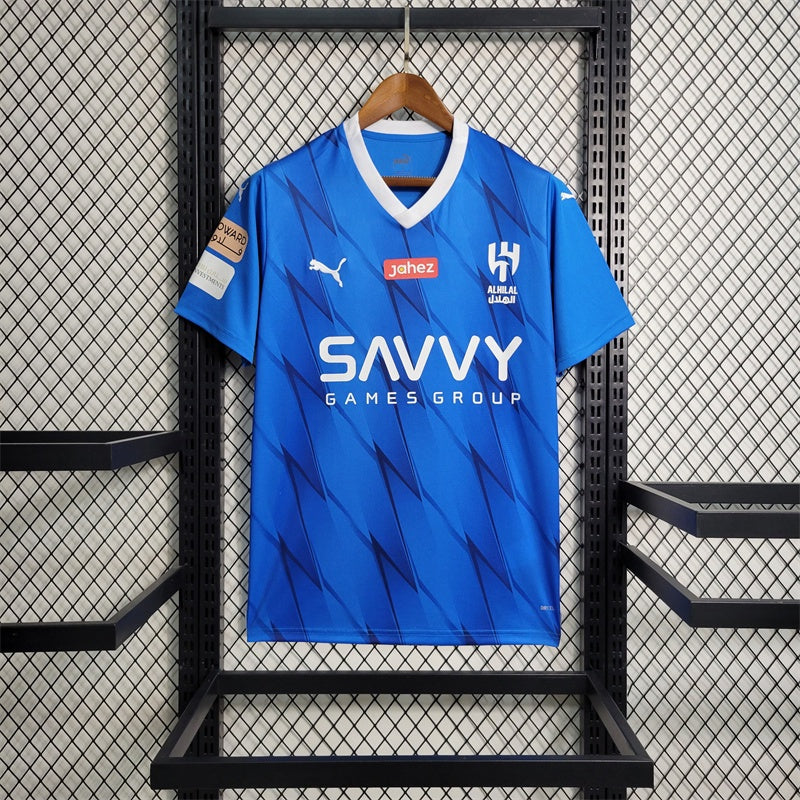 camisa-gola-v-masculina-puma-al-hilal-home-titular-1-2023-24-torcedor-azul-branco-branca-arabia-saudita-neymar-savvy-seven
