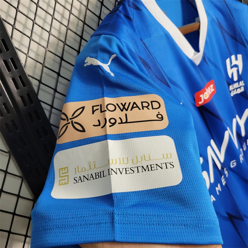 camisa-gola-v-masculina-puma-al-hilal-home-titular-1-2023-24-torcedor-azul-branco-branca-arabia-saudita-neymar-savvy-seven
