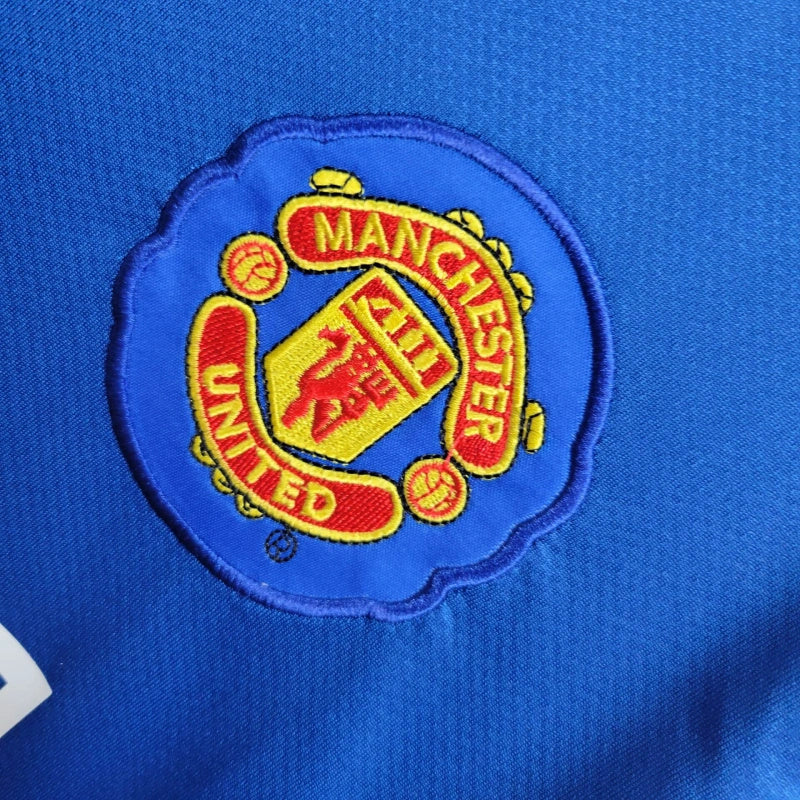 camisa-manga-longa-comprida-manchester-united-diabos-vermelhos-third-terceira-3-2008-09-nike-retro-masculina-masculino-aig-champions-league-mundial-branca-branco-azul-nani-cristiano-ronaldo-cr7-rooney-scholes-giggs-anderson-valencia-evra