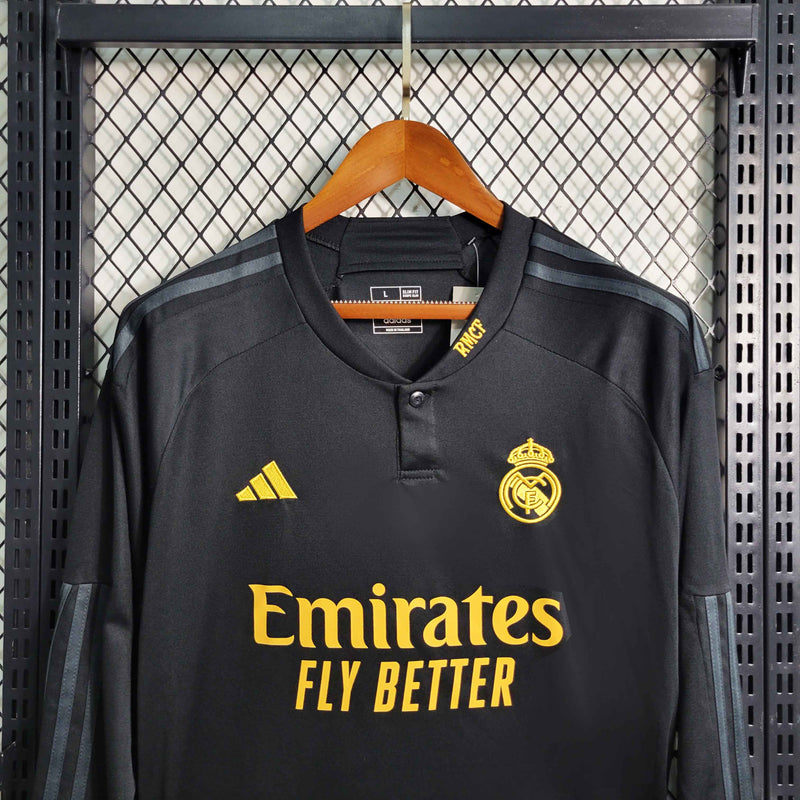 camisa-manga-longa-comprida-third-3-terceira-madrid-2023-24-adidas-emirates-fly-better-torcedor-masculina-masculino-preto-preta-dourado-dourada-dorado-dorada-vini-jr-mbappe-rodrygo-modric-bellingham-endrick-valverde-carvajal-lucas-vasquez