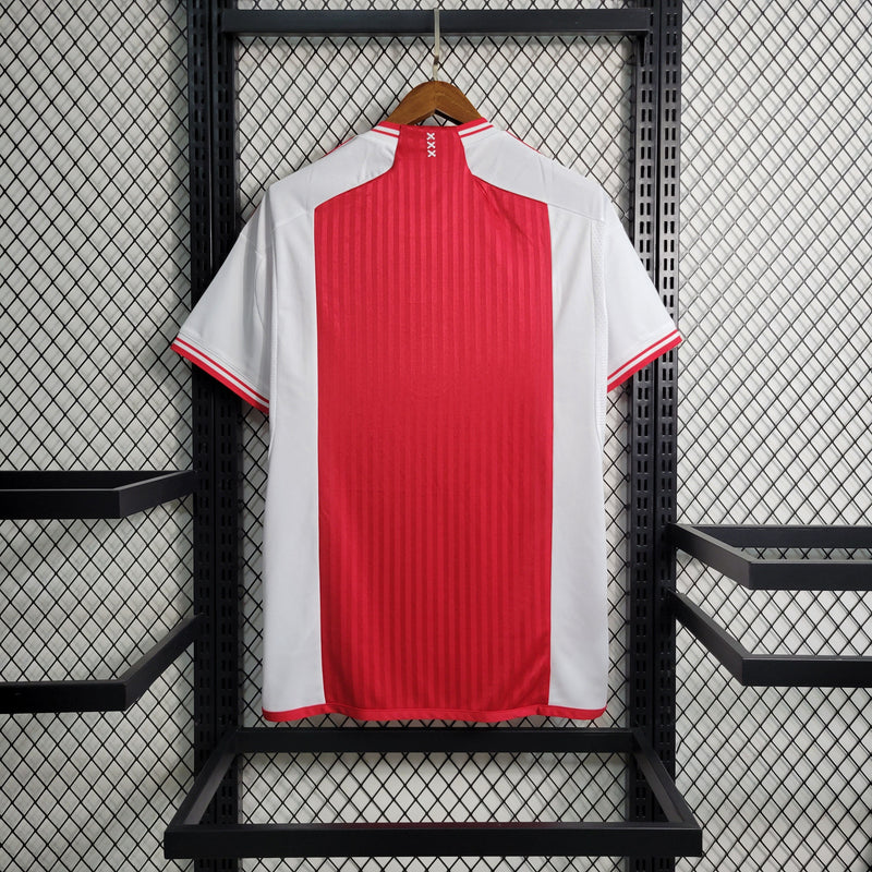 camisa-masculina-adidas-ajax-home-titular-1-2023-24-torcedor-vermelha-vermelho-branco-branca-amsterdam-ziggo

