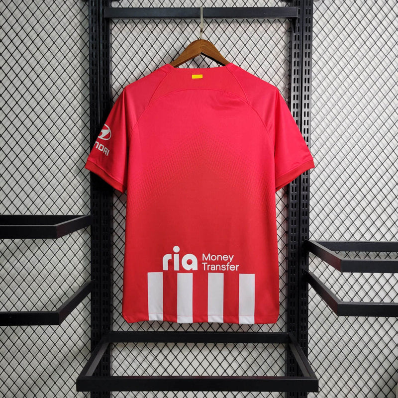 camisa-masculina-atletico-madrid-madri-2023-24-nike-home-titular-1-torcedor-branco-branca-vermelha-vermelho-riyadh-air-grizmann
