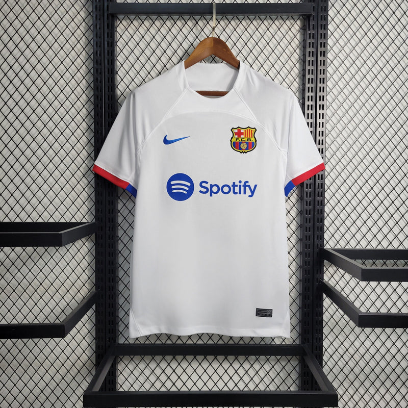 camisa-masculina-barcelona-barca-away-reserva-2-2023-24-nike-torcedor-branca-branco-azul-vermelha-vermelho-spotify-unicef-fcb-messi-neymar-suarez
