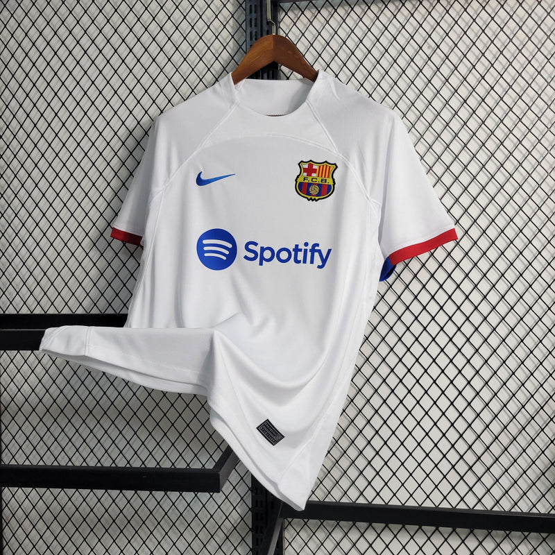 camisa-masculina-barcelona-barca-away-reserva-2-2023-24-nike-torcedor-branca-branco-azul-vermelha-vermelho-spotify-unicef-fcb-messi-neymar-suarez