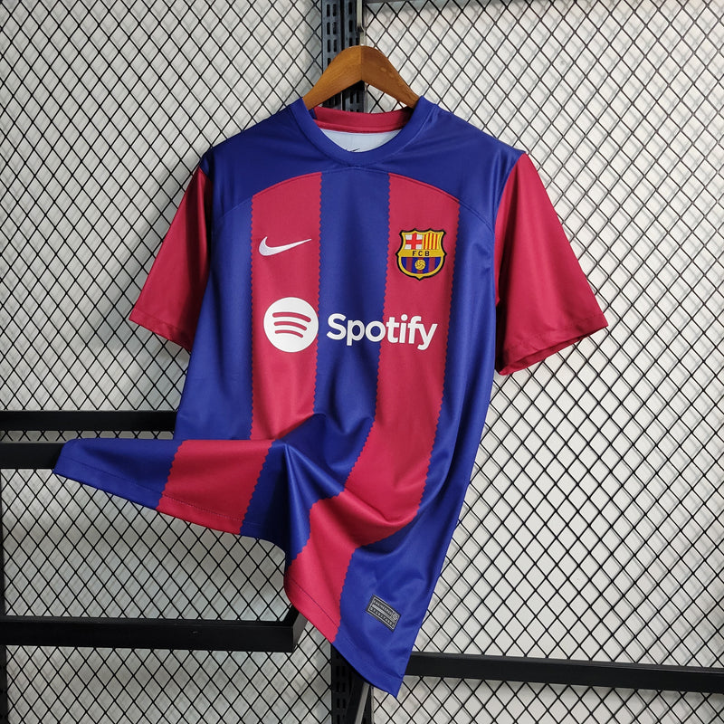 camisa-masculina-barcelona-barca-home-titular-1-2023-24-nike-torcedor-azul-vermelho-vermelha-spotify-fcb-messi-suarez-neymar
