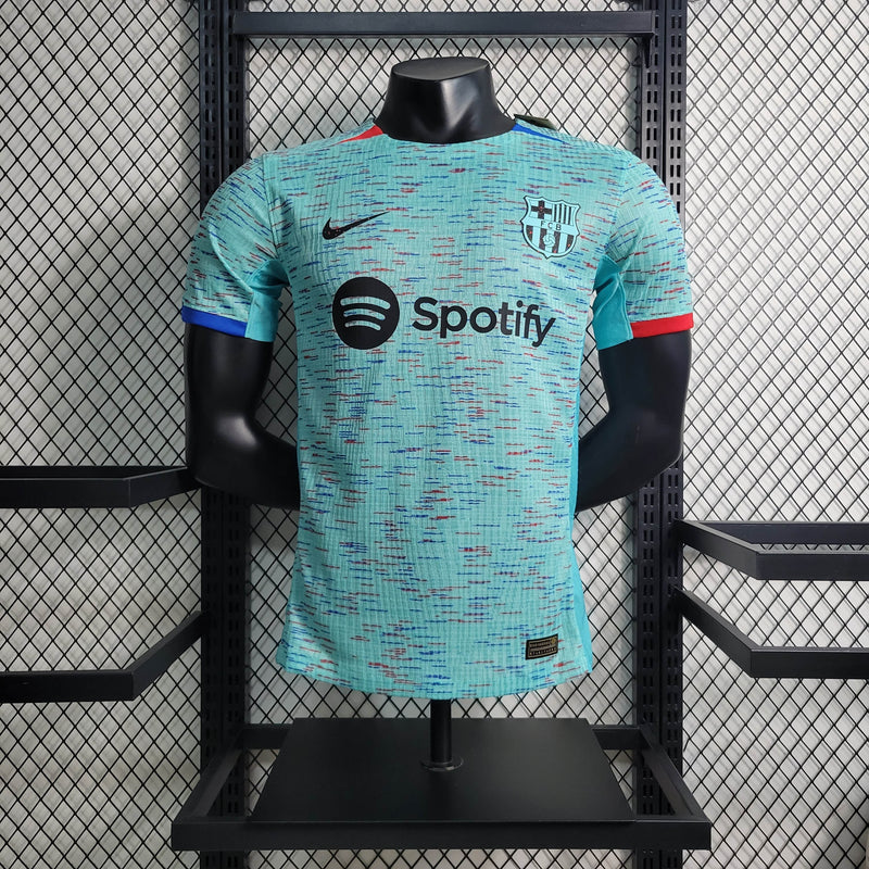 camisa-masculina-barcelona-barca-third-terceira-3-2023-24-nike-jogador-azul-vermelha-vermelho-verde-preto-preta-fcb-spotify-messi-neymar
