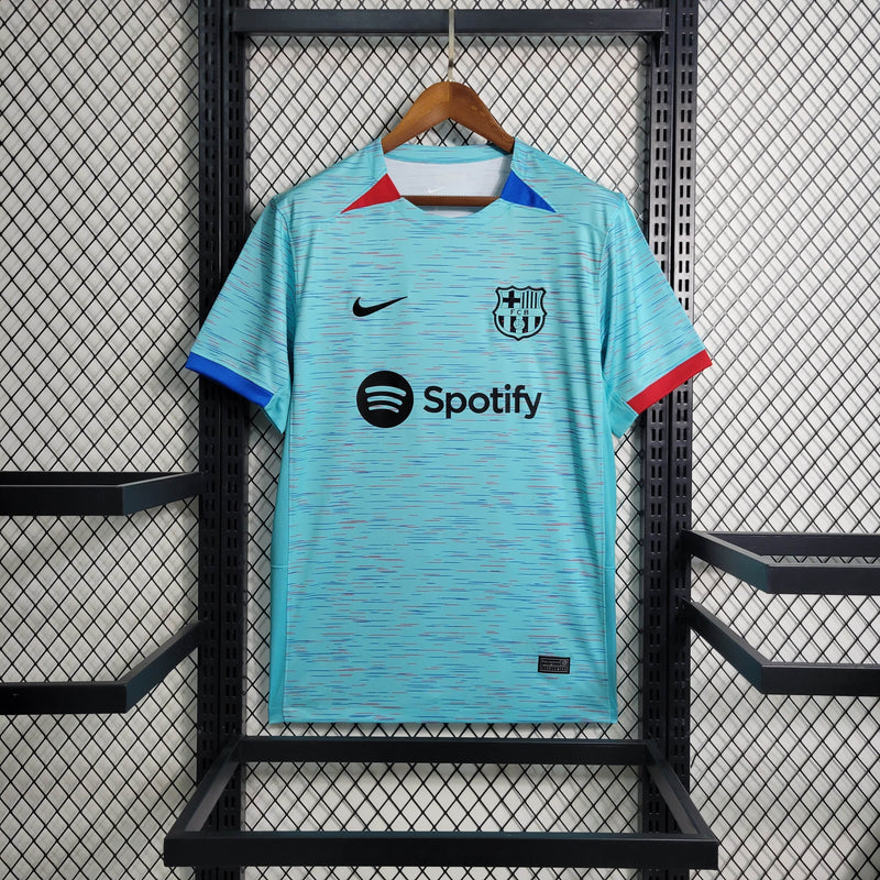 camisa-masculina-barcelona-barca-third-terceira-3-2023-24-nike-torcedor-azul-vermelha-vermelho-verde-preto-preta-fcb-spotify-messi-neymar
