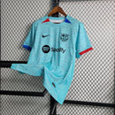 camisa-masculina-barcelona-barca-third-terceira-3-2023-24-nike-torcedor-azul-vermelha-vermelho-verde-preto-preta-fcb-spotify-messi-neymar
