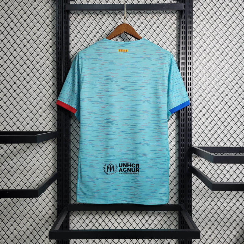 camisa-masculina-barcelona-barca-third-terceira-3-2023-24-nike-torcedor-azul-vermelha-vermelho-verde-preto-preta-fcb-spotify-messi-neymar
