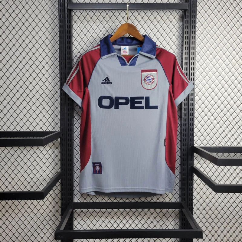 camisa-masculina-masculino-bayern-de-munique-away-reserva-2
-1998-99-adidas-retro-cinza-bordo-opel
