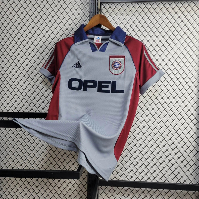 camisa-masculina-masculino-bayern-de-munique-away-reserva-2
-1998-99-adidas-retro-cinza-bordo-opel