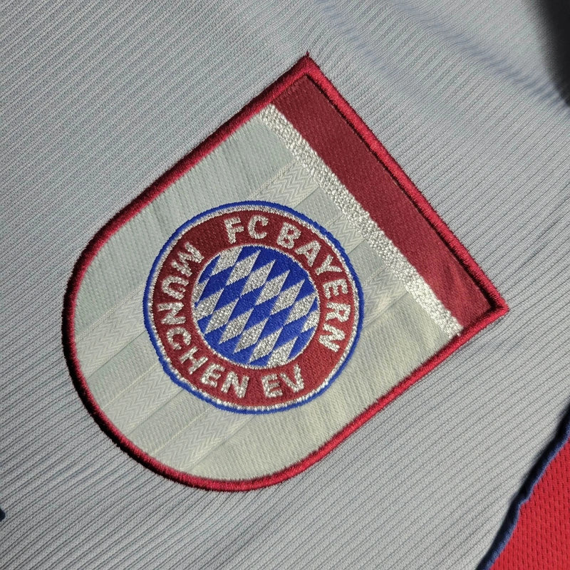 camisa-masculina-masculino-bayern-de-munique-away-reserva-2
-1998-99-adidas-retro-cinza-bordo-opel