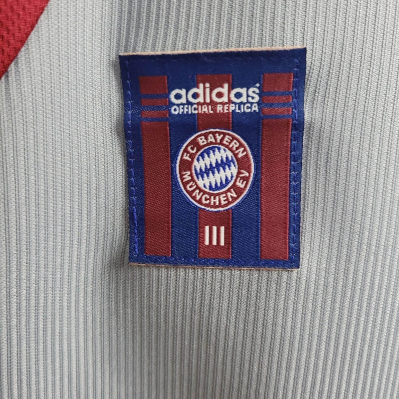camisa-masculina-masculino-bayern-de-munique-away-reserva-2
-1998-99-adidas-retro-cinza-bordo-opel