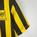 camisa-masculina-nike-al-Ittihad-home-titular-1-2023-24-torcedor-amarelo-amarela-preto-preta-arabia-saudita-benzema
