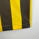 camisa-masculina-nike-al-Ittihad-home-titular-1-2023-24-torcedor-amarelo-amarela-preto-preta-arabia-saudita-benzema
