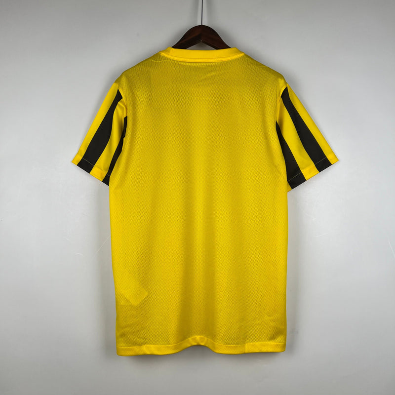 camisa-masculina-nike-al-Ittihad-home-titular-1-2023-24-torcedor-amarelo-amarela-preto-preta-arabia-saudita-benzema
