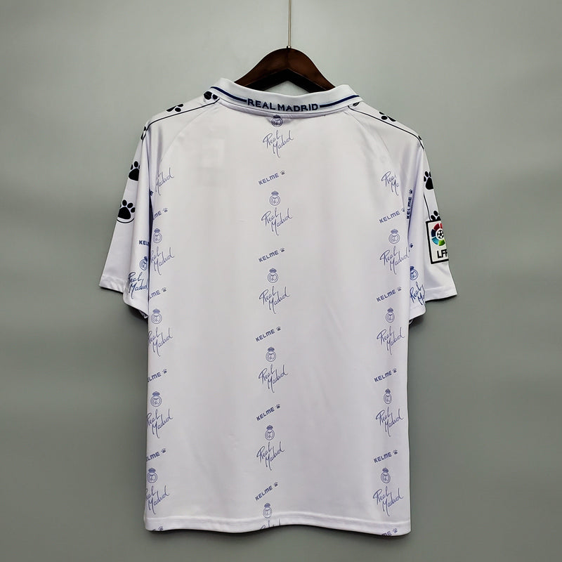 camisa-masculina-real-madrid-madri-home-titular-1-1994-96-kelme-retro-branco-branca-azul-ronaldo-cr7-teka
