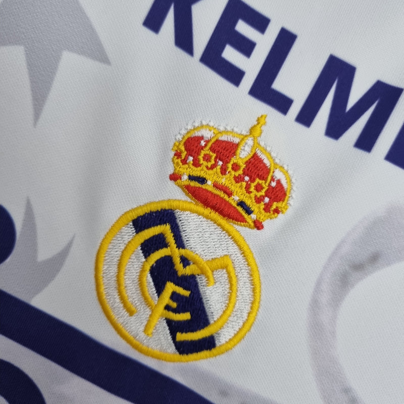 camisa-masculina-real-madrid-madri-home-titular-1-1997-98-kelme-retro-branca-branco-azul-ronaldo-cr7-teka-champions-league