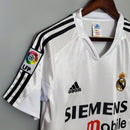 camisa-masculina-real-madrid-madri-home-titular-1-2004-05-adidas-retro-branco-branca-preto-preta-ronaldo-cr7-siemens-mobile
