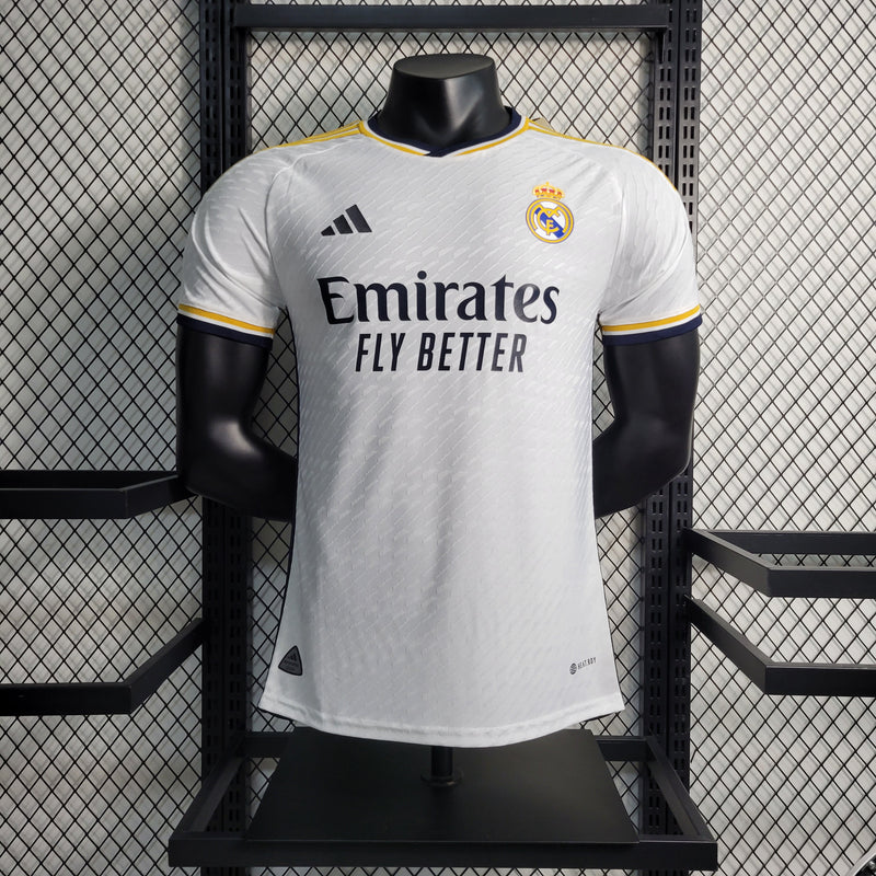 camisa-real-madrid-madri-home-titular-1-2023-24-adidas-emirates-fly-better-jogador-masculina-branca-branco-azul-cr7-vini-jr-kroos