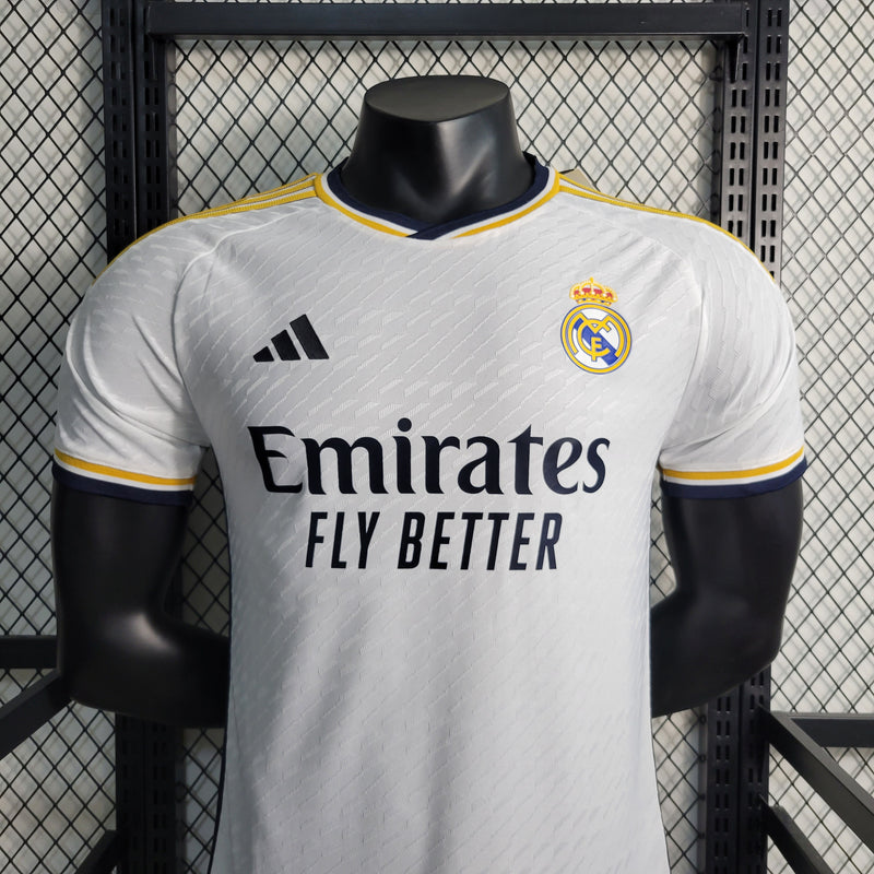 camisa-real-madrid-madri-home-titular-1-2023-24-adidas-emirates-fly-better-jogador-masculina-branca-branco-azul-cr7-vini-jr-kroos