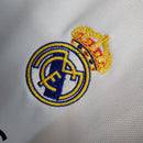 camisa-real-madrid-madri-home-titular-1-2023-24-adidas-emirates-fly-better-torcedor-feminina-branca-branco-azul-cr7-vini-jr-kroos