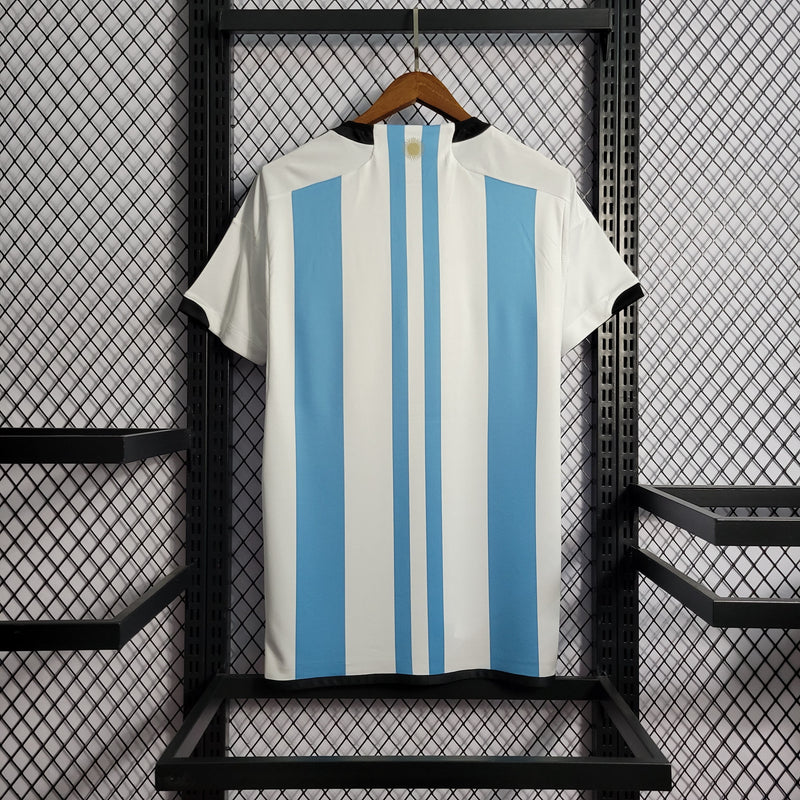 camisa-selecao-argentina-home-titular-1-2023-24-adidas-torcedor-masculina-branca-branco-azul-messi-lionel