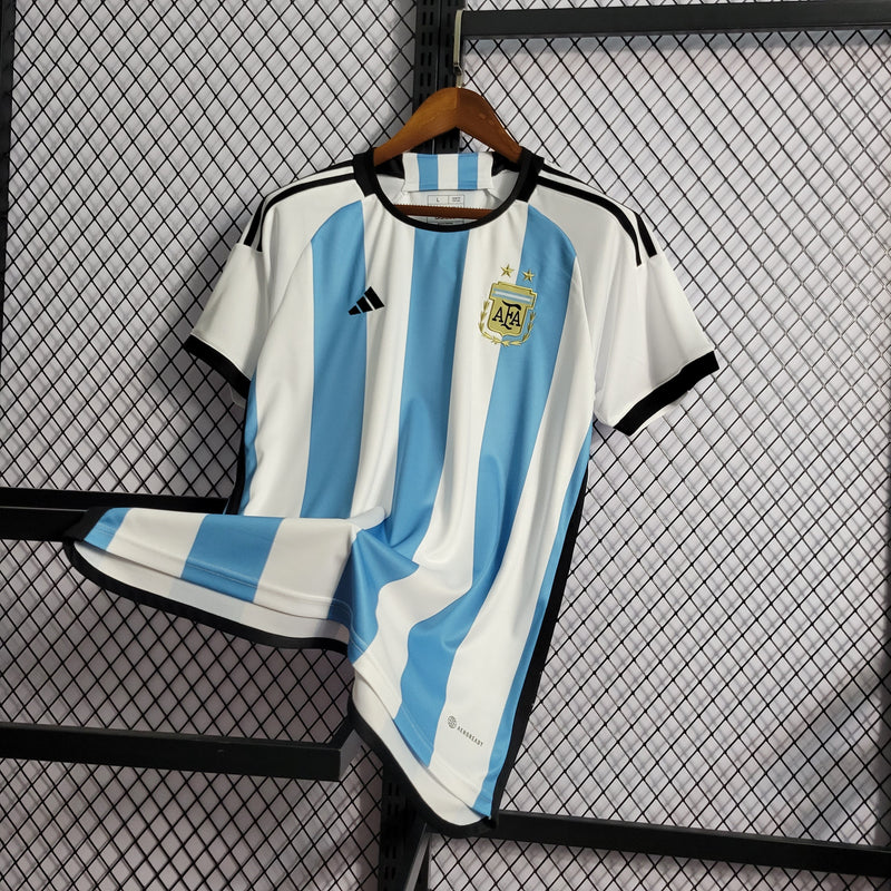 camisa-selecao-argentina-home-titular-1-2023-24-adidas-torcedor-masculina-branca-branco-azul-messi-lionel