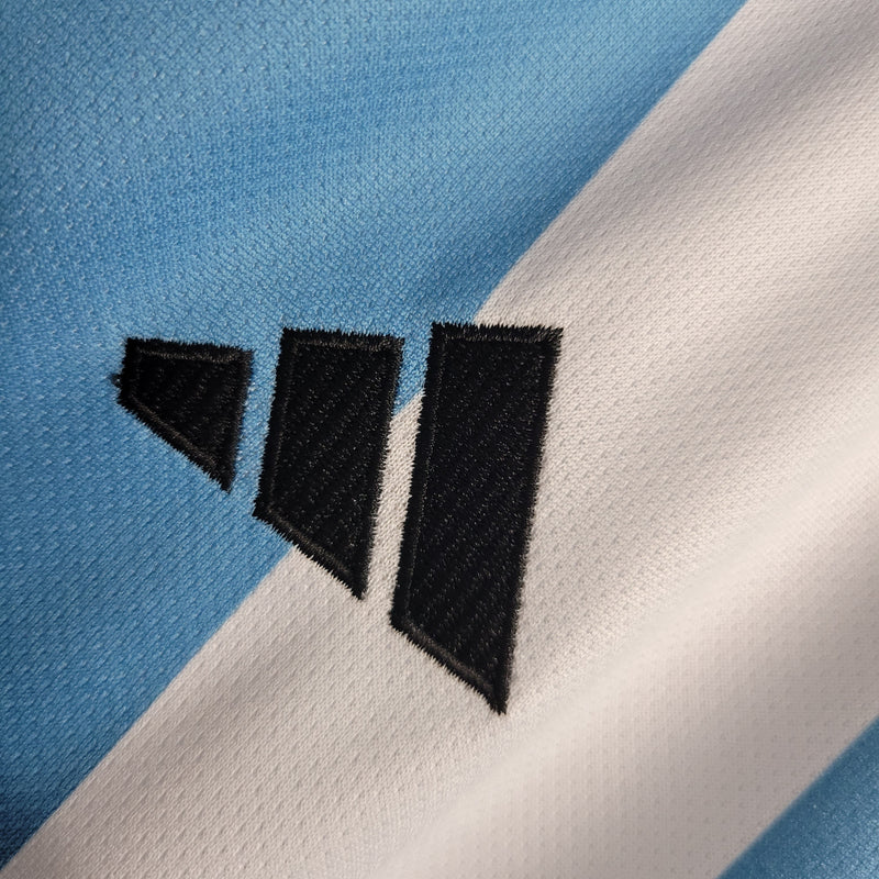 camisa-selecao-argentina-home-titular-1-2023-24-adidas-torcedor-masculina-branca-branco-azul-messi-lionel
