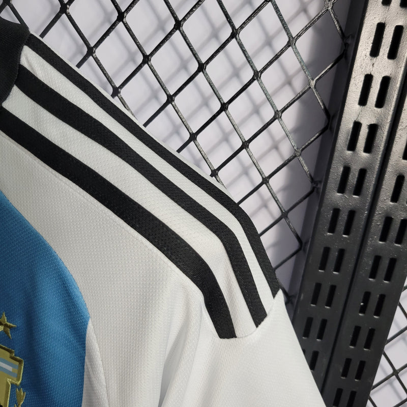 camisa-selecao-argentina-home-titular-1-2023-24-adidas-torcedor-masculina-branca-branco-azul-messi-lionel